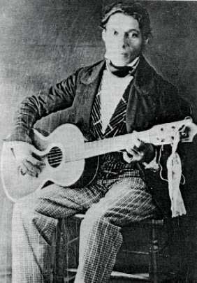 Young Jos de la Rosa with guitar