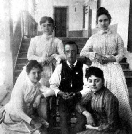 Charles Lummis poses at Rancho Camulos with women from the del Valle family