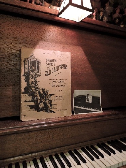 Spanish Songs of Old California, on piano with historic picture of a folio on a piano. Photo by Vykki Mende Gray