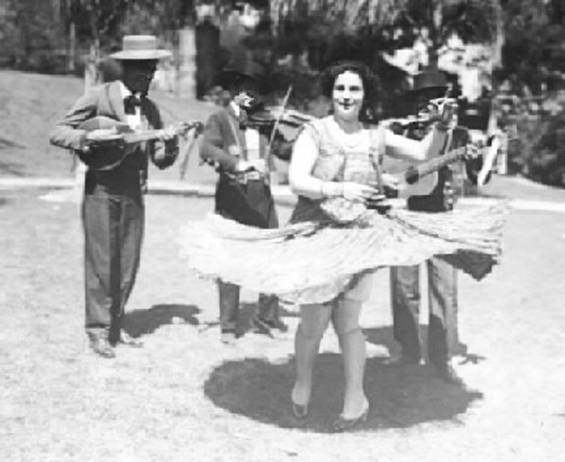The José Arias Troubadours with Mexican dancer (José Sr. is on the
                           right with the big smile) Los Californios Collection